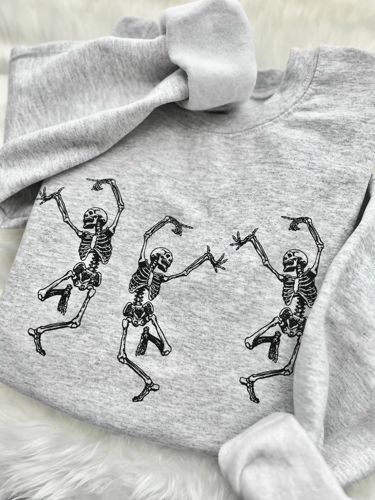 DANCING SKELETONS SWEATSHIRT
