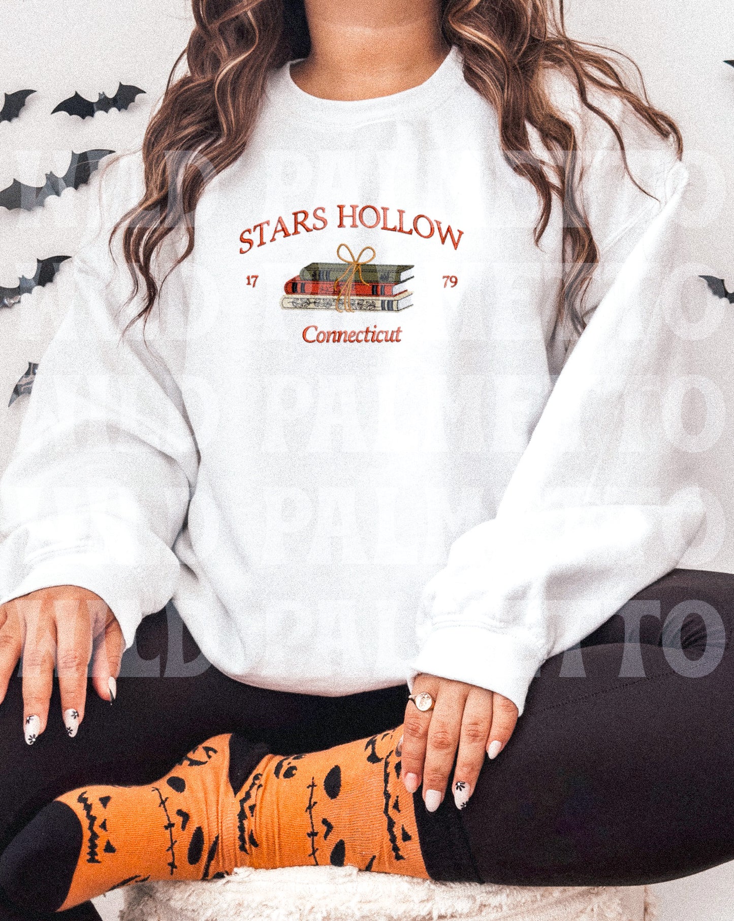 STARS HOLLOW BOOKS EMBROIDERED SWEATSHIRT