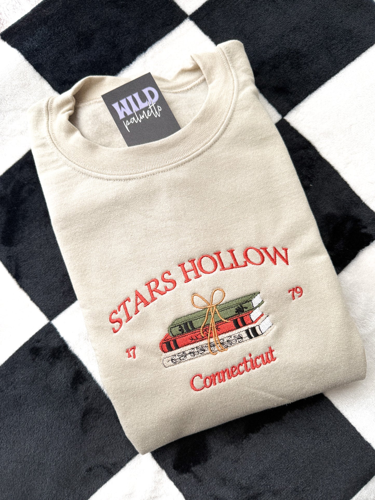 STARS HOLLOW BOOKS EMBROIDERED SWEATSHIRT