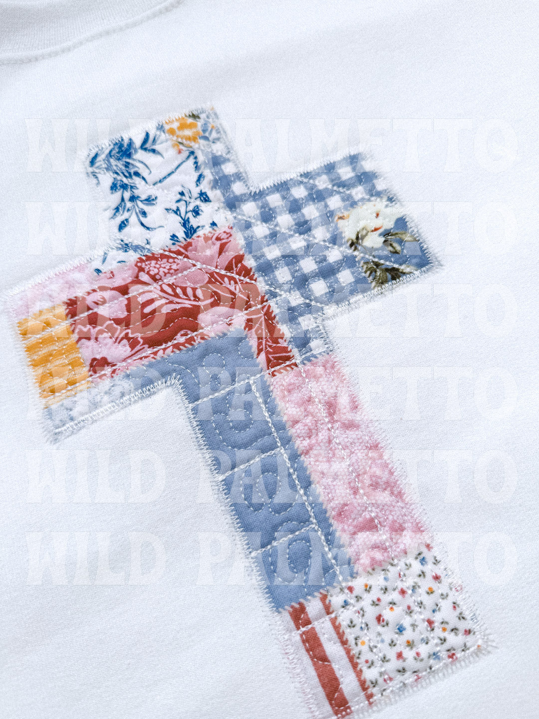 PATCHWORK CROSS EMBROIDERED SWEATSHIRT