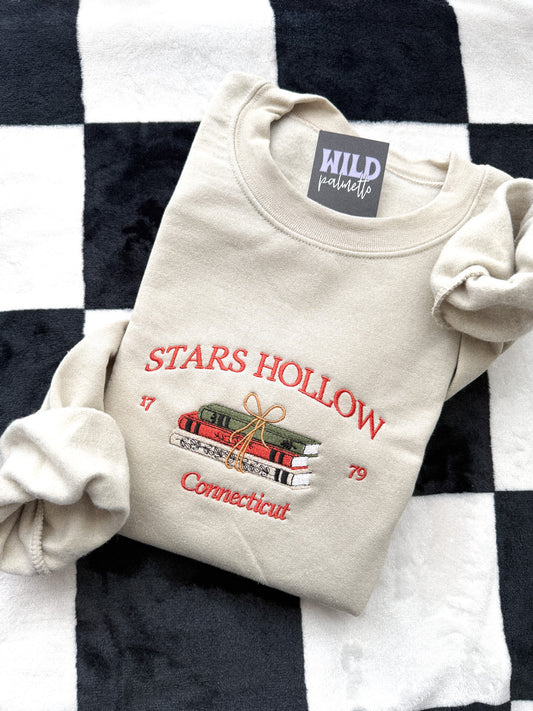 STARS HOLLOW BOOKS EMBROIDERED SWEATSHIRT