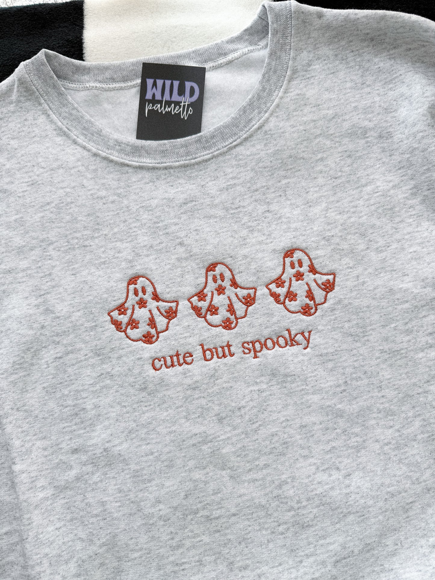 CUTE BUT SPOOKY EMBROIDERED SWEATSHIRT