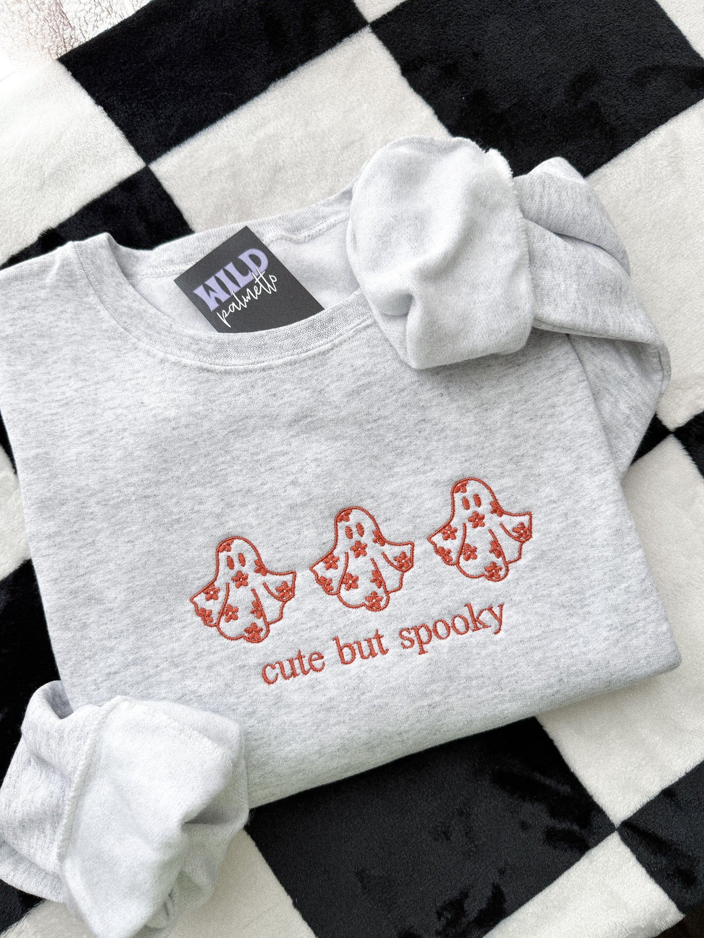 CUTE BUT SPOOKY EMBROIDERED SWEATSHIRT