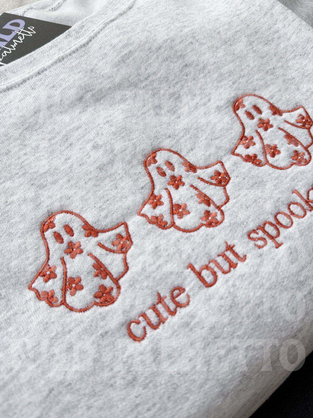 CUTE BUT SPOOKY EMBROIDERED SWEATSHIRT