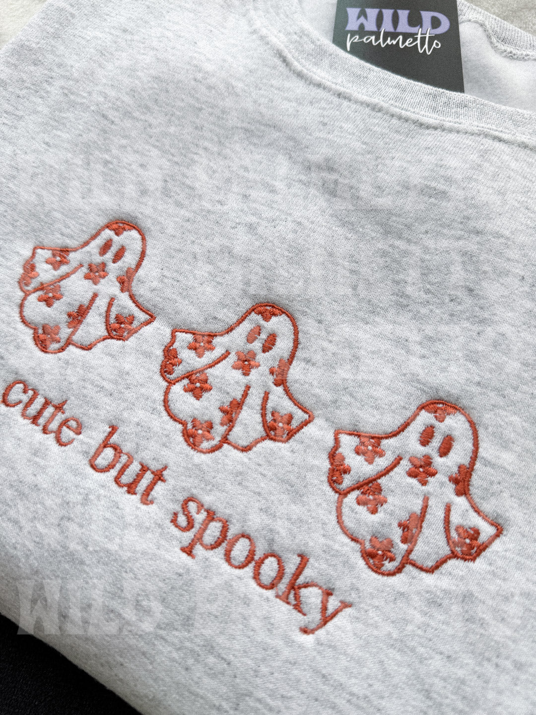 CUTE BUT SPOOKY EMBROIDERED SWEATSHIRT