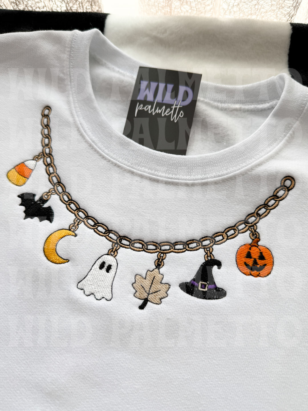 HALLOWEEN NECKLACE EMBROIDERED SWEATSHIRT