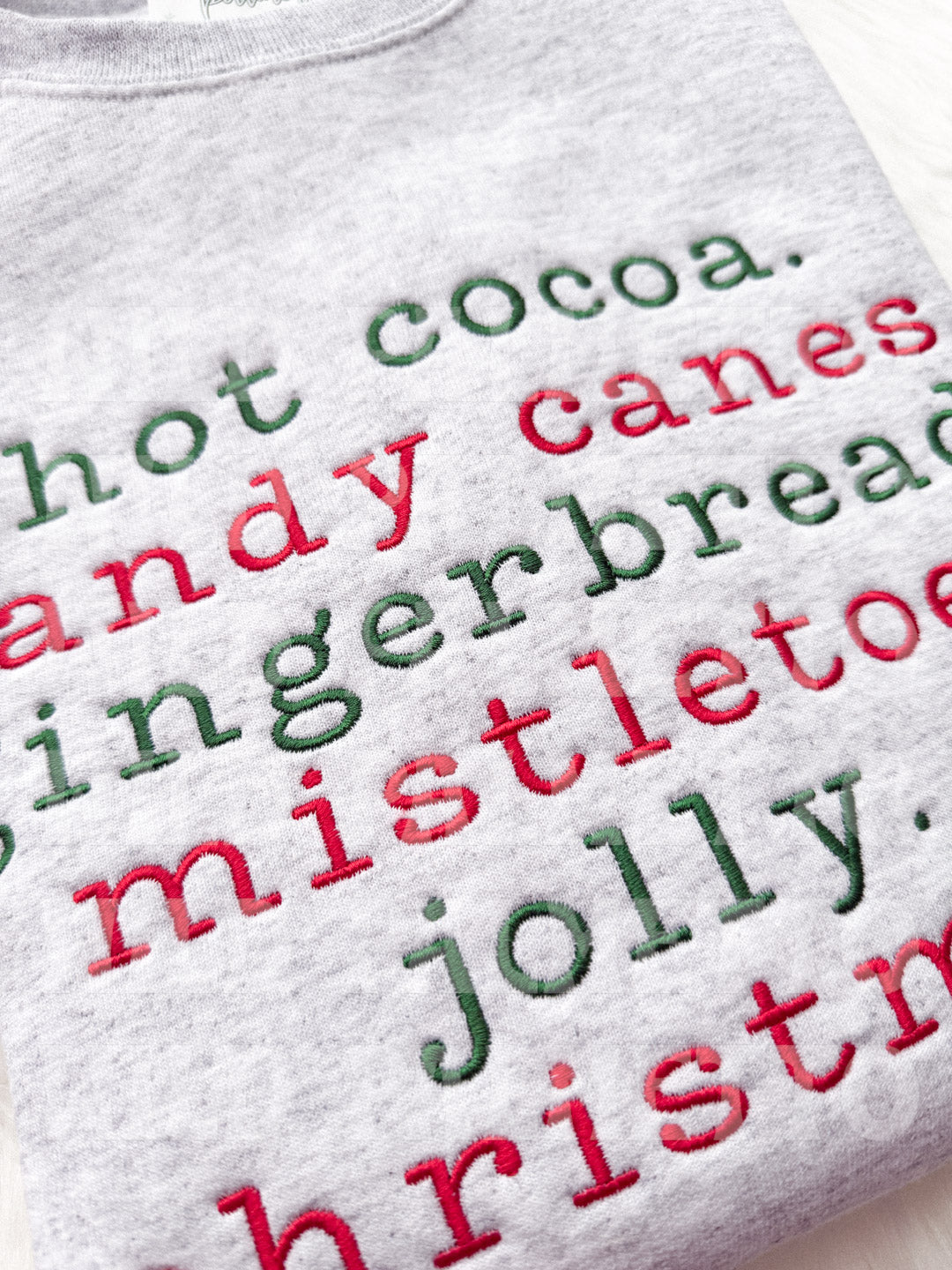 CHRISTMAS PHRASES EMBROIDERED SWEATSHIRT